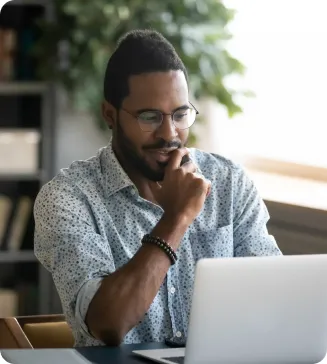 Focused man working on a project in modern office