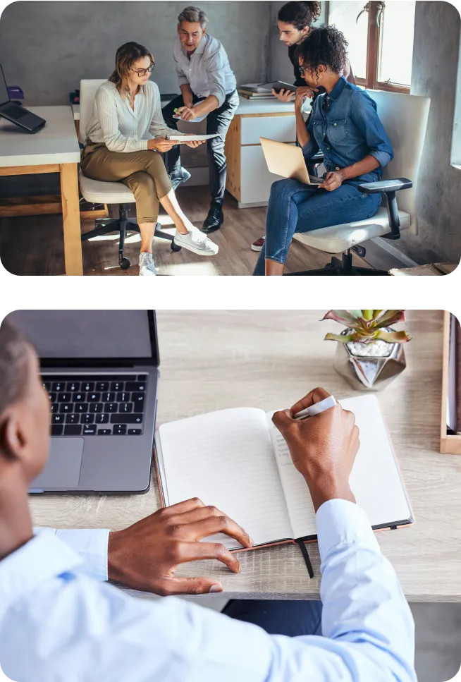 Four people collaborating during a meeting and man with a computer writing in a notebook