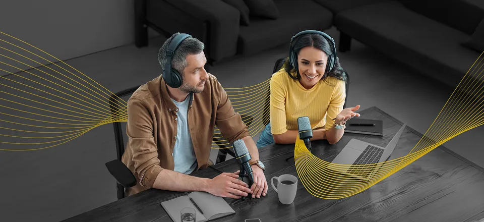 Male and female coworkers with a tablet working on a presentation